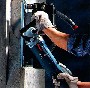 Бурение отверстий в кирпичных и бетонных стенах
